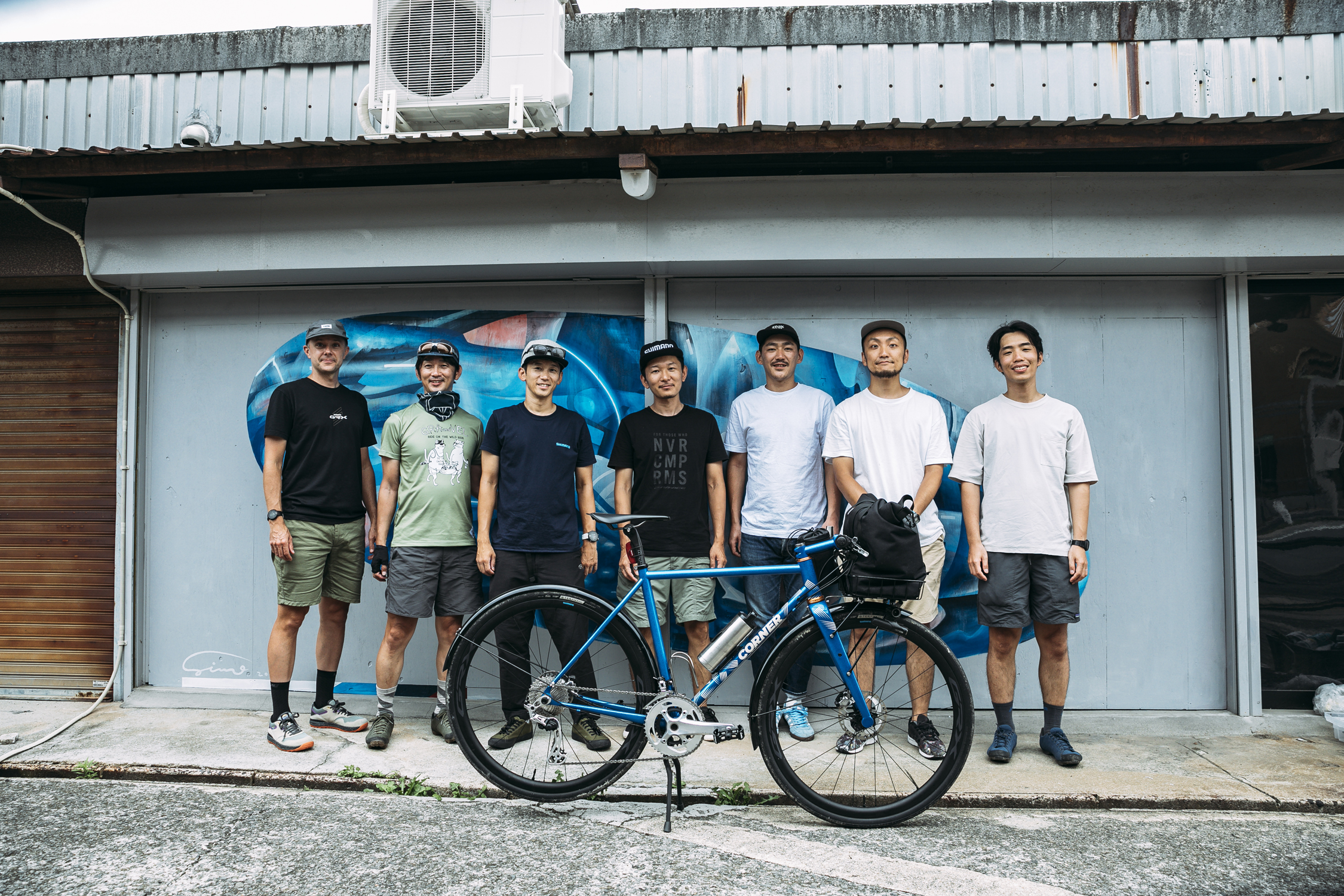 The corner bike crew outside the shop